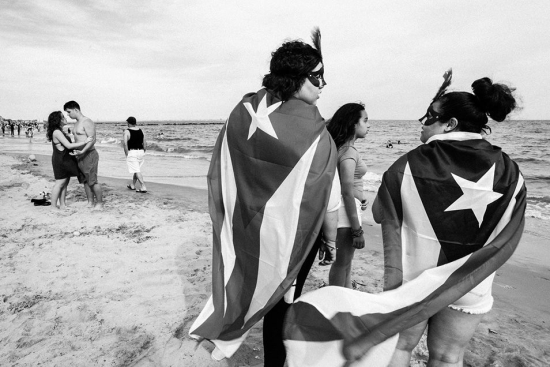 Welles-GirlsWithFlagsAndMasks_ConeyIsland_2014